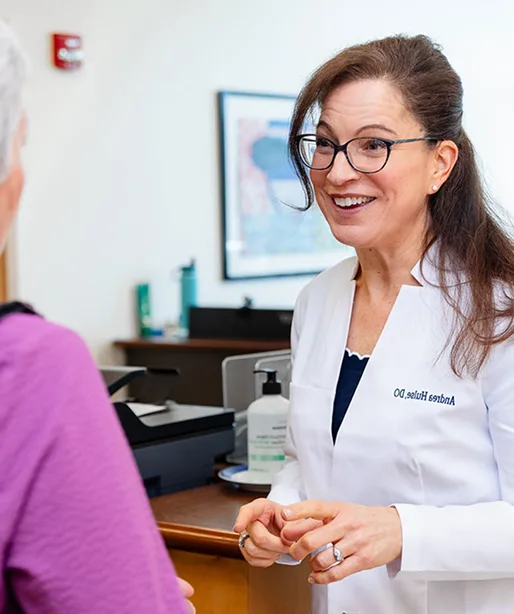 A physician in conversation with a patient