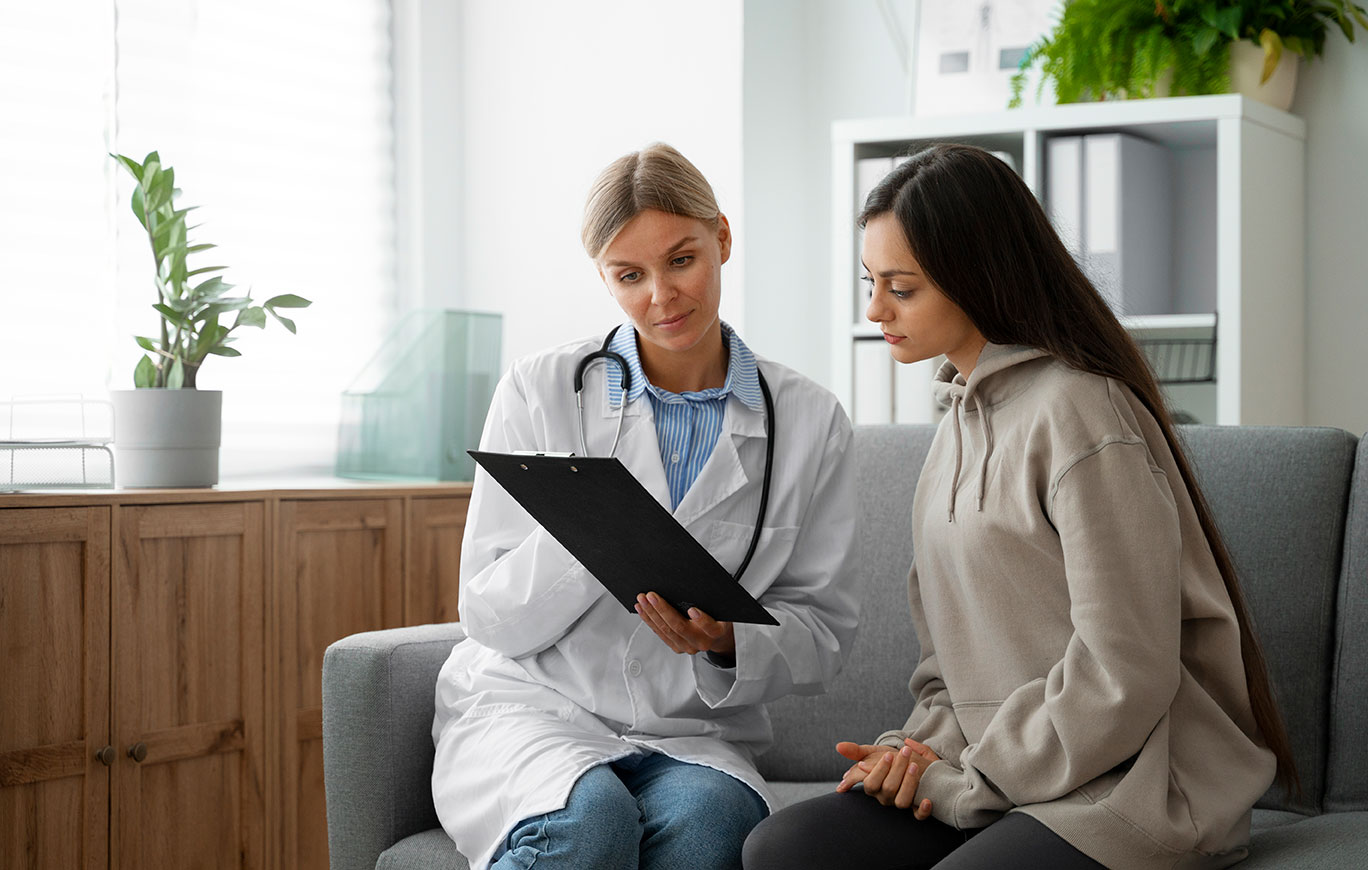 Doctor providing personalized healthcare guidance to a patient during a calm, focused consultation.