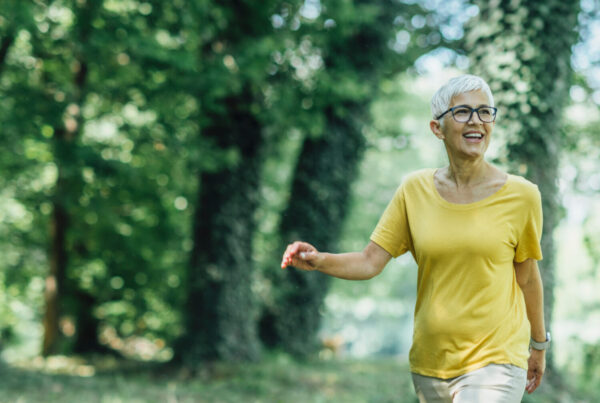woman over 40 walking outside for health